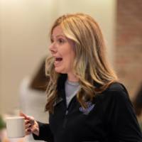 person standing, laughing